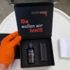 Top Coat Verpackung offen mit Inhalt Fasche Applikator und Applikatortücher TopCar